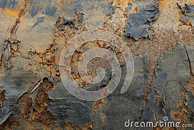 Rust texture small brown rust pockets rusty brown weathered surface with torn plastic sheet ontop of it Stock Photo