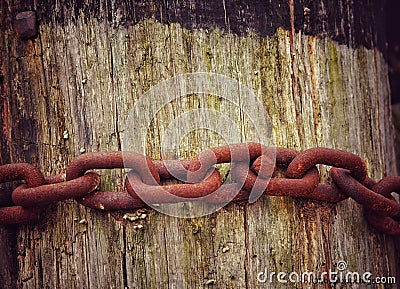 Rust on a wooden pole Stock Photo