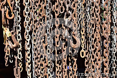 Rusted chains and hooks Stock Photo