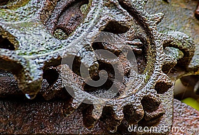 Rusted Gears Of A Long Abandoned Piece Of Farm Machinery Stock Photo