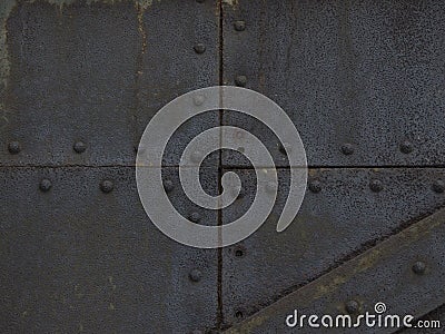 Rusted metal texture with rivets Stock Photo