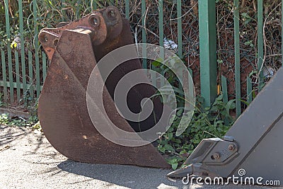 A rusted old metal tractor arm Stock Photo
