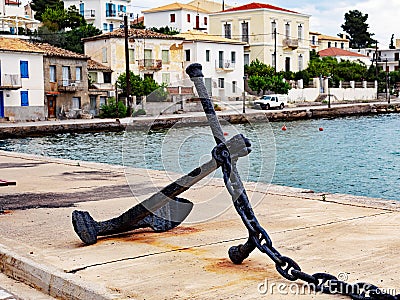 Rusted Ship Anchor, Galaxidi Waterfront, Greece Stock Photo