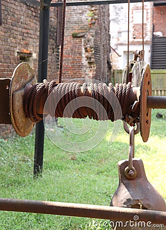 Rusted Spindle from Ancient Factory Remains Stock Photo