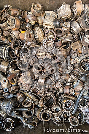 rusted steel scrap pile of used car parts and pieces Stock Photo