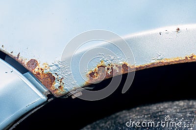 Rusted wheel arch. Stock Photo