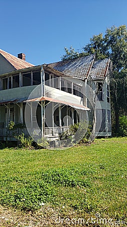 Rustic abandoned Victorian plantation house Stock Photo