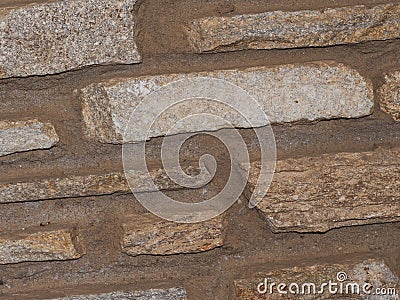 Rustic and aged wallstone, textured Stock Photo