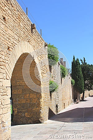 Rustic ancient city walls in Alcudia, Mallorca, Spain Stock Photo