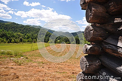 Rustic architectural detail with mountain on background Stock Photo