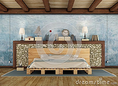 Rustic bedroom with pallet double bed Stock Photo