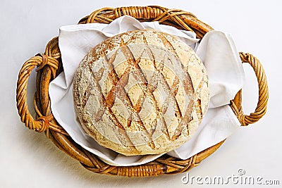 Rustic bread in bakery basket Stock Photo