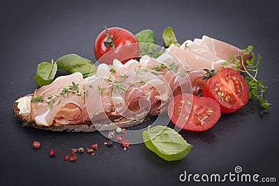 Rustic bread with cured ham Stock Photo