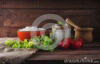 Rustic bread withfresh cream cheese, cottage cheese, tomatoes, for breakfast or snack. Stock Photo