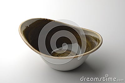 Rustic brown chinese bowl isolated on white background Stock Photo