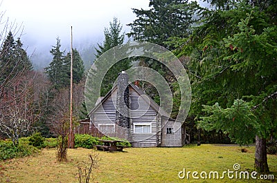 Rustic Cabin in the woods Stock Photo