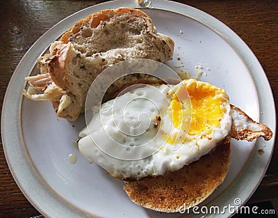 Unhealthy food : Rustic chicken sandwich with fried egg and bagel Stock Photo