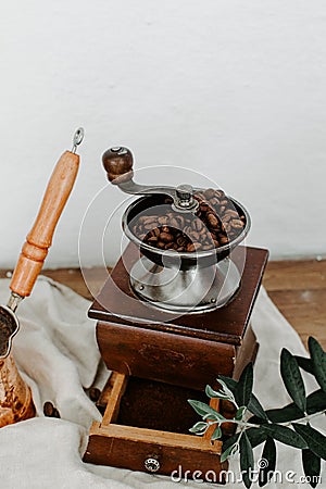 Rustic coffee grinder with coffee Stock Photo