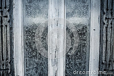 Rustic frosted window with vintage wood frame as Christmas background Stock Photo