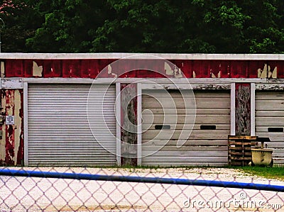 Rustic garage building with big roll-up doors Stock Photo