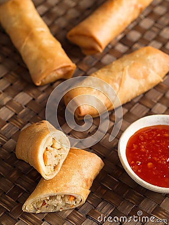 Rustic golden chinese spring rolls Stock Photo
