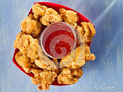 Rustic golden fried popcorn chicken nugget Stock Photo