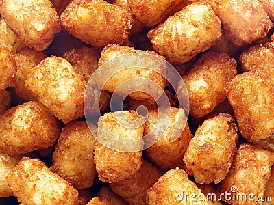 Rustic golden potato tater tots food background Stock Photo