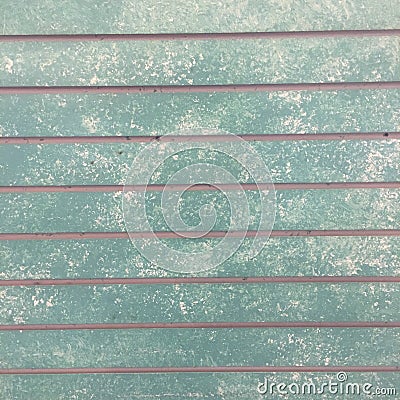 Rustic grungy urban slat wall in green and grey Stock Photo