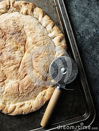 Rustic italian calzone stuffed pizza Stock Photo