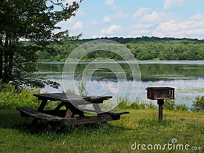 Lakeside Picnic Area With Barbeque Stock Photo