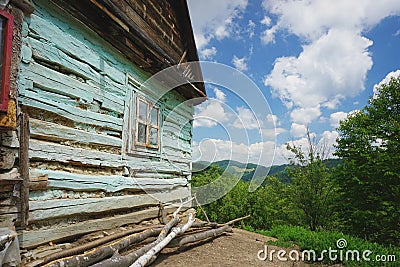 Rustic landscape with side of old wooden house Stock Photo