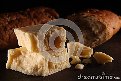 Rustic Mature Cheddar Cheese and Bread Stock Photo