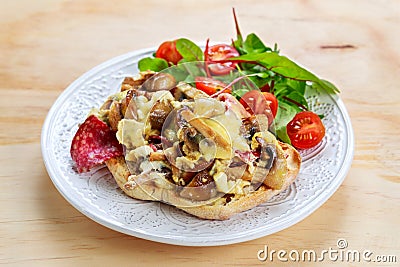 Rustic Morning Breakfast, toast with mushrooms, cheese omelette and fresh vegetables Stock Photo