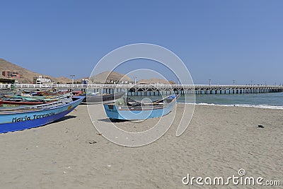 Rustic multi colored fishing boats in Cerro Azul, Lima Editorial Stock Photo