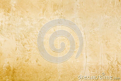 Rustic old European classical style gold stucco wall patina background texture Stock Photo