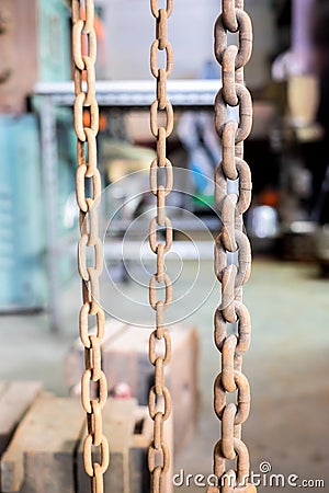 Rustic old grunge chains link in old factory Stock Photo