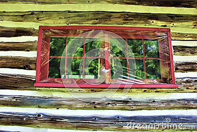 Rustic old log cabin windows located in Childwold, New York, United States Stock Photo