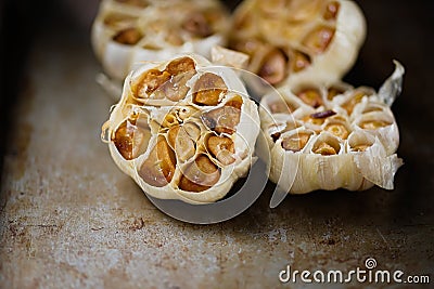 Rustic roasted baked garlic Stock Photo