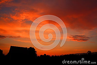 Rustic sunset in scarlet colors Stock Photo