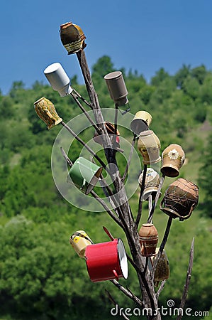 Rustic tradition in Maramures, landmark attraction in Romania - pot peg. Tree pots Stock Photo