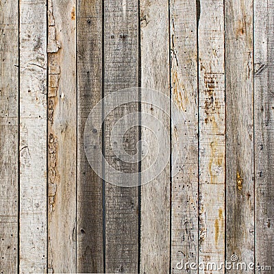 Rustic weathered barn wood background with knots and nail holes Stock Photo