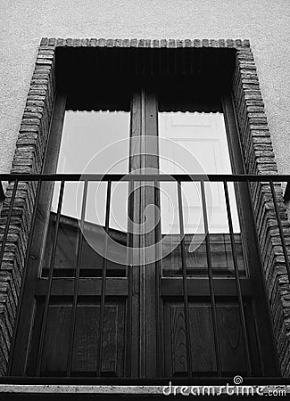 Rustic window with railing Stock Photo