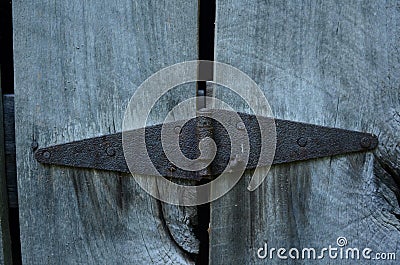 Rustic wood barn details rusty hinges Stock Photo