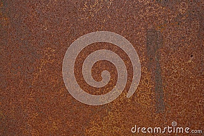 Rusting as abstract background. Textured reddish-brown rust coating forming on surface of iron due wet air. Stock Photo