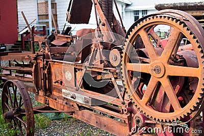 Rusting old vintage farm machinery Stock Photo