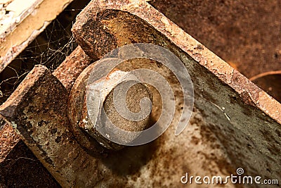 Rusty bolt with a washer in a cobweb Stock Photo