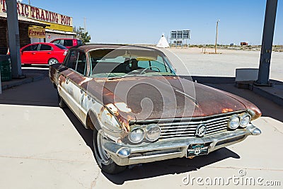 Rusty car with skeleton Editorial Stock Photo