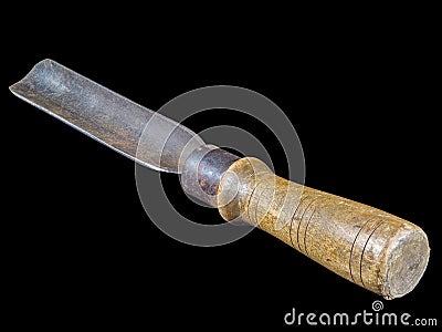 Carpenter chisel with wooden handle isolated on black Stock Photo