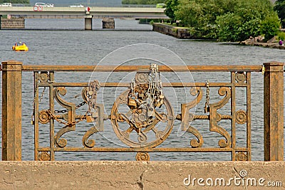 Rusty bridge ballustrade with love locks in Liepaja, Latvia Editorial Stock Photo