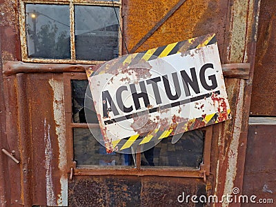 Rusty Dirty Old Safety Danger Sign Stock Photo